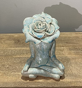 Image of the clay sculpture, Flower Figure 1 by Jessa Lohr.
